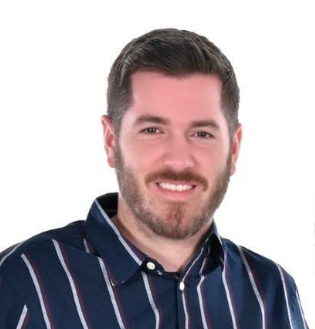 Portrait of Lee, also known as MadMaverick, the founder and creator of Swing Scout, smiling in a navy striped shirt.